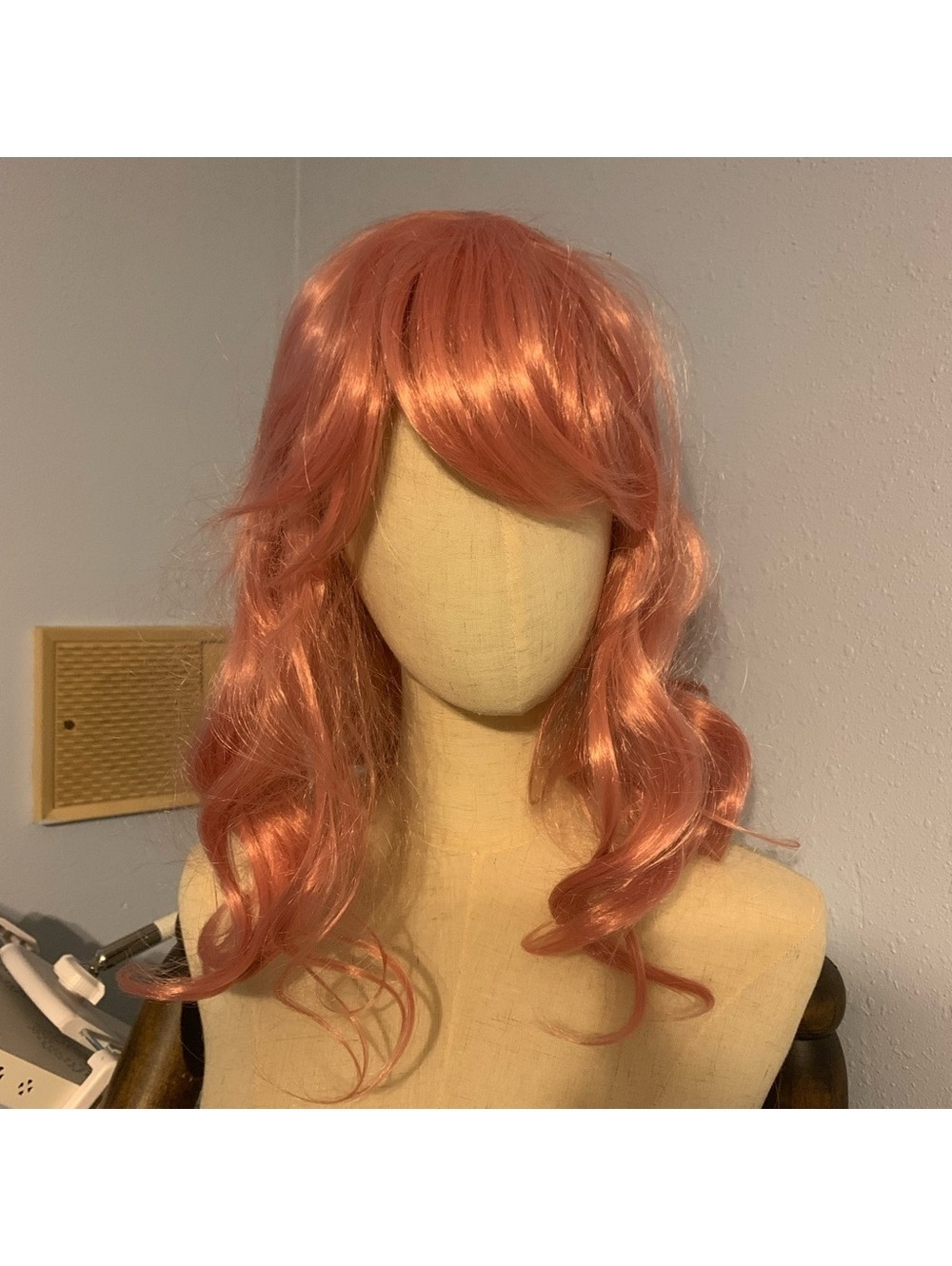 Wavy Medium-Length Pink Colored Synthetic Wig with Side Bangs